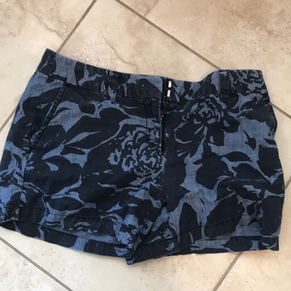 Dark and light blue shorts.